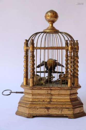 Petit automate représentant un oiseau en cage doré…