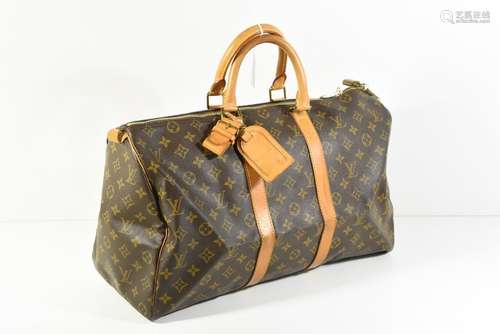 Sac de voyage Louis Vuitton en toile monogramme av…