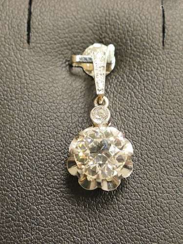 Pendentif 1900 en platine serti de diamants retena…