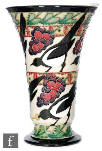 A Moorcroft Pottery vase in The Secret pattern designed by Kerry Goodwin, of footed flared form,