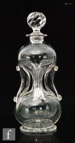 An Edwardian clear crystal Scrooge decanter with applied prunt decoration and wrythen stopper,