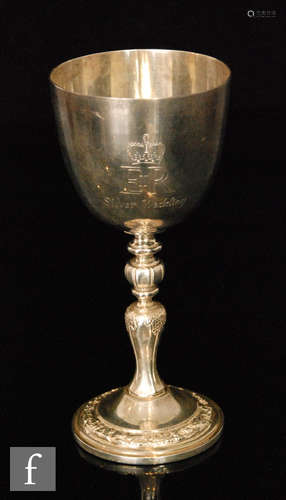 A silver commemorative 'Silver Wedding' goblet, of typical form with splayed foot and knopped stems,