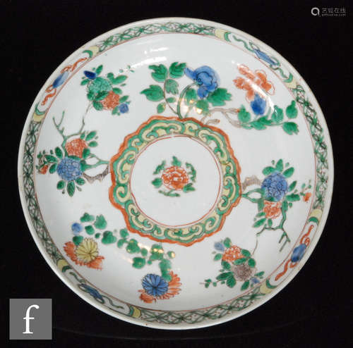 A late 18th/early 19th Century Chinese famille verte dish, of circular form with central roundel