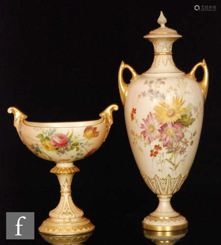 Two pieces of Royal Worcester blush ivory, a shape 1921 twin handled pedestal vase, decorated with