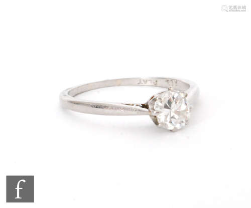 An early 20th Century platinum diamond solitaire ring, transitional cut claw set stones, weight