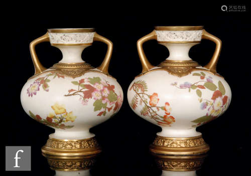 Two Royal Worcester ivory twin handled vases in shape 1089, both with reticulated neck and floral