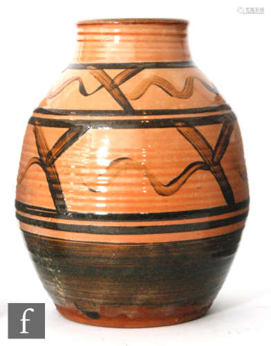 A Winchcombe studio pottery vase by Michael Cardew, a hand thrown vase of ovoid form with collar