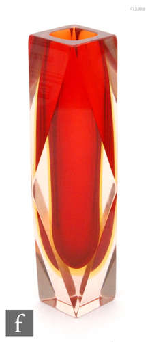 A 20th Century Murano sommerso vase of faceted form, the red core cased in yellow and clear,