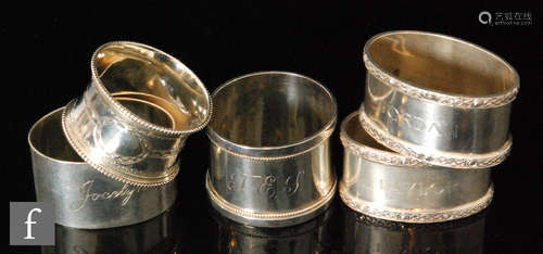 Five assorted hallmarked silver napkin rings, various styles and dates, total weight 5.5oz. (5)