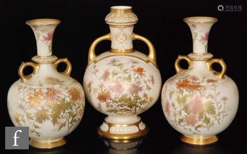 A Royal Worcester twin handled vase in shape 1034, decorated with floral sprays highlighted in gilt,