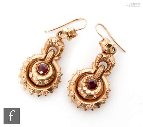 A pair of early 20th Century 9ct rose gold drop earrings each set with a single almandine garnet,