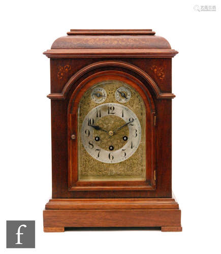 An early 20th Century mahogany bracket clock in the Georgian taste, with inlaid acanthus leaf detail