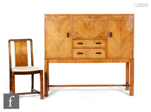 An Art Deco walnut veneered dining suite, comprising cocktail cabinet / sideboard on stand, with