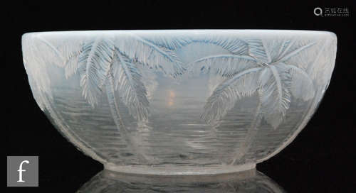 A Czechoslovakian Barolac bowl with a relief moulded palm tree pattern, all in a graduated