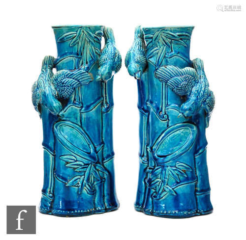 A pair of late 19th to early 20th British vases in the manner of Burmantofts, each formed as