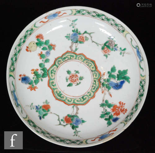 A Chinese famille verte Kangxi (1662-1722) period dish, of circular form, the shallow well with