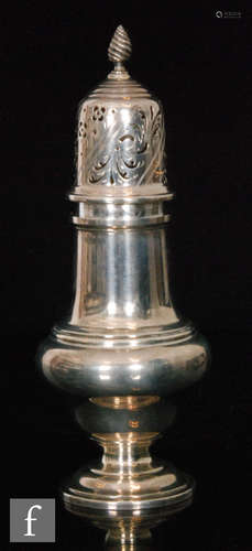 A hallmarked silver baluster sugar castor terminating in spiral finial, height 20cm, Birmingham