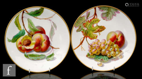 A pair of plates decorated with fruits and foliage by Champion for the retailer Hebert Freres on