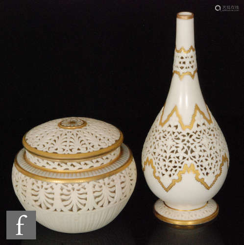 A Grainger & Co vase of footed bottle form, with reticulated foliate decoration and gilt detail,