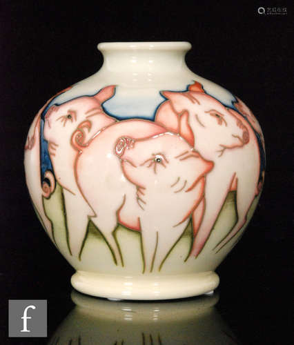 A Moorcroft Pottery vase in the Fowler's Farmyard Pigs pattern designed by Kerry Goodwin, the footed