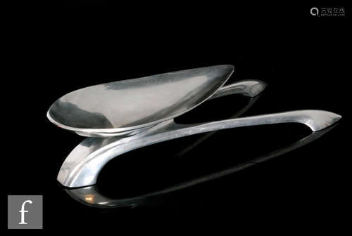 A mid century aluminium bowl and stand by Matthew Hilton, the tear drop shaped bowl stood on a