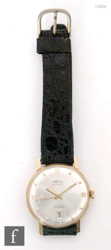 A 9ct hallmarked Gentleman's Trebex wrist watch, batons and date facility to a silvered circular