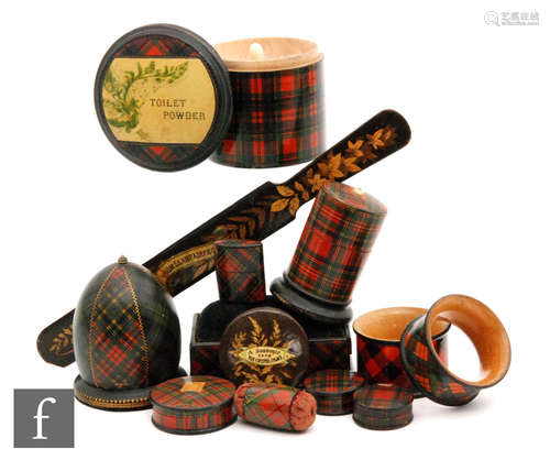 Fourteen items of Tartan Ware to include napkin rings, pill boxes, pin cushions and a related