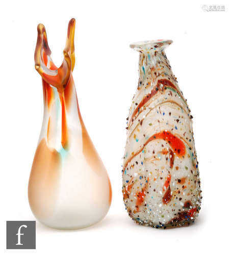 A 20th Century art glass vase of ovoid form with tapered neck and pulled rim, decorated in mottled