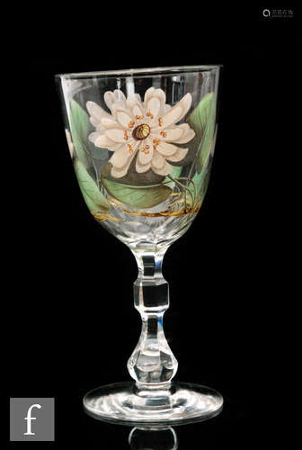 An early 20th Century Theresienthal drinking glass with a faceted knop and slender faceted stem,