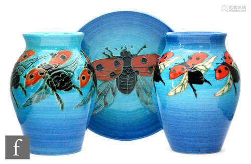 A collection of three Dennis China Works items in the ladybird pattern on a blue wash ground