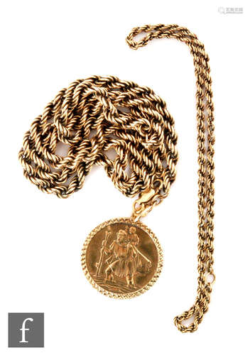 A 9ct St Christopher pendant suspended from a 9ct rope twist chain, with a rope twist bracelet,