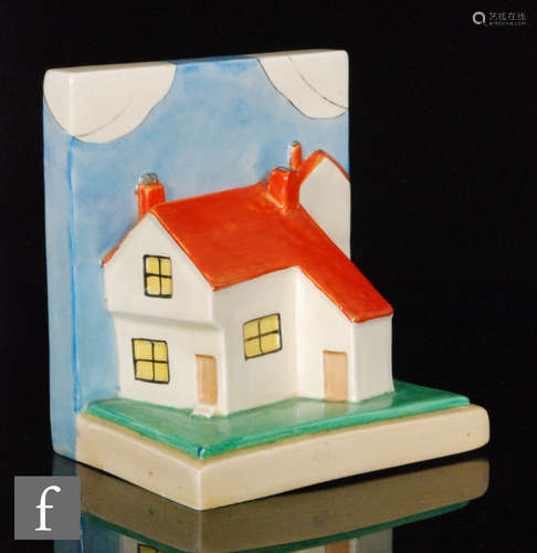 A Clarice Cliff shape 410 'Cottage' book end circa 1932 hand painted in enamel colours, A.J.