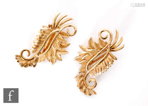 A pair of 18ct clip earrings each modelled as stylised leaves, total weight 13.5g.