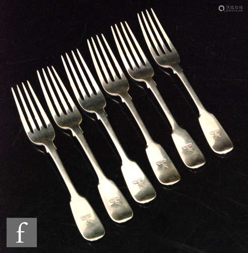 A set of six Victorian hallmarked silver fiddle pattern dessert forks, engraved crest to