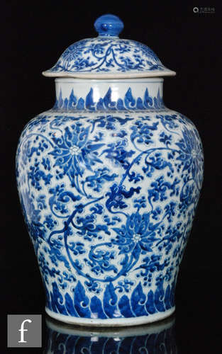 A 20th Century Chinese blue and white Kangxi style jar and cover, of baluster form, rising to a