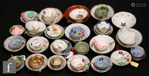 A collection of Japanese mid 20th Century saki cups, each of circular conical form, all produced and