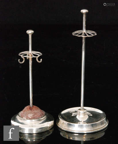 A hallmarked silver circular hat pin stand of plain form, with a similar smaller example, London