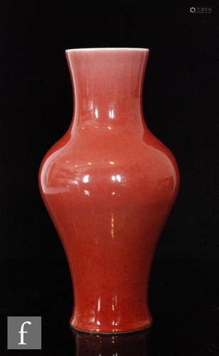 A Chinese 'Peachbloom' glazed vase, Kangxi (1662-1722) six-character mark to base, of baluster form,