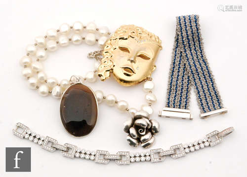 Five items of modern jewellery to include a silver and silk threaded bracelet, a paste set bracelet,