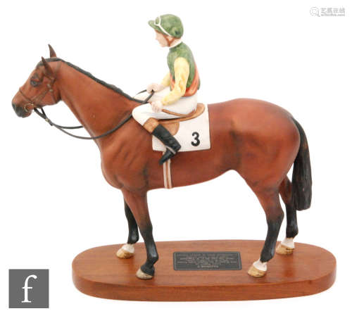 A Beswick Connoisseur model of Nijinsky with Lester Piggott up, mounted to an oval wooden plinth,