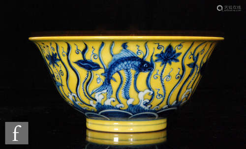 A Chinese yellow ground bowl, Chenghua six-character (1465-1487) mark to base of tapered 'U' form,