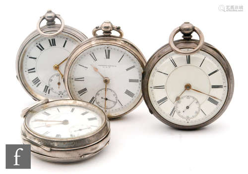 Three hallmarked silver open faced key wind pocket watches to include an English Lever example, with