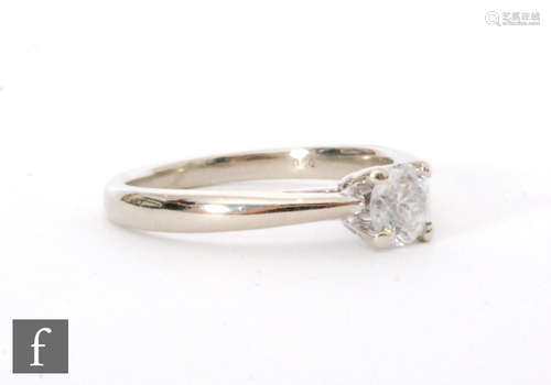 A 9ct white gold diamond solitaire ring, claw set, brilliant cut stone, weight 050ct, colour I/J,