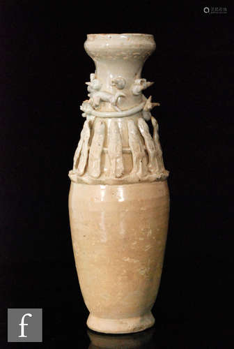 A Chinese funerary jar of tapered rounded form, the neck adorned with figural and zoomorphic