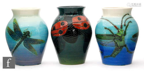 Three Dennis China Works vases of baluster form, all with patterns designed by Sally Tuffin,