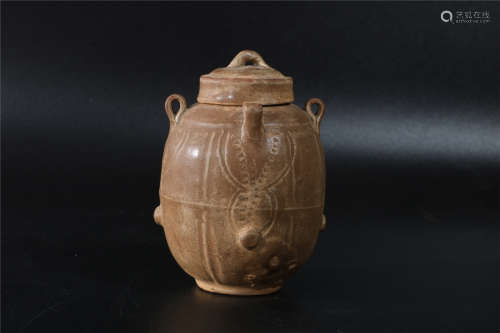 A CHINESE CELADON TEA HOLDER, MING DYNASTY