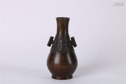 A CHINESE BRONZE VASE WITH TAOTIE MOTIF, MIDDLE QING DYNASTY