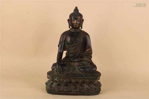 A CHINESE COPPER SEATED SHAKYAMANI, QING DYNASTY