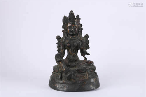 A CHINESE BRONZE FIGURE OF GUANYIN, MING DYNASTY