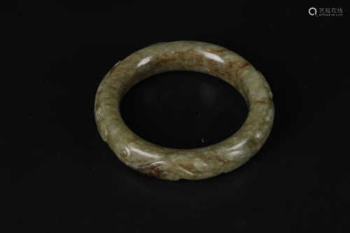 A CHINESE FINE WHITE JADE BANGLE, YUAN DYNASTY